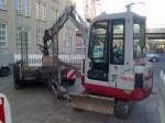 Ein TAKEUCHI Typ TB016 Minibagger (Leasingbaumaschine), 12.11.11 Berlin-Mitte.