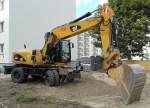 CAT M318D Mobilbagger am 01.07.14 Berlin-Pankow.