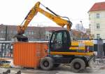 Leasingbaumaschine: Ein JCB JS145W Mobilbagger am 19.11.11 Berlin-Pankow.