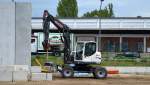 Der kleine TEREX TW110 Mobilbagger der Fa. CRAMO am 05.05.15 Großbaustelle Berlin-Moabit.