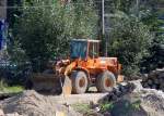 Ein schon etwas �lterer CAT Radlader Typ 938 F der Baufirma KEMMER, Sommer 2008 Gro�baustelle Berlin Ostkreuz.