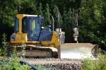 KOMATSU GALEO D41P Raupe, 03.09.10 Baustelle am Bhf. Flughafen Berlin-Sch�nefeld.