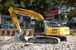 Ein NEW HOLLAND E215 Raupenbagger am 31.07.08 Gro�baustelle Berlin Alexanderplatz.