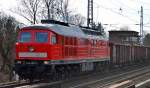 Eine leicht dampfende 232 469-7 mit Ganzzug offener Güterwagen am 24.02.15 Berlin-Karow.