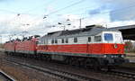 Lokzug mit der Doppeltraktion 143 019-8 + 143 558-5 mit 232 128-9 am Haken am 04.12.17 Bf. Flughafen Berlin-Schönefeld.