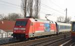 EC 378 mit 101 100-6 mit Seitenwerbung Richtung Bernau am 07.03.14 Berlin-Karow.