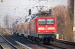 RE3 Richtung Elsterwerda mit 112 184-7, 17.11.01 Berlin-Karow.