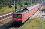 RE4 nach Rathenow mit 112 113-6 im Bhf.