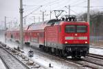 RE3 nach Elsterwerda mit 112 110 Richtung Berlin-Gesundbrunnen, 21.01.13 Berlin-Blankenburg.