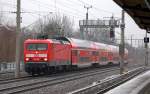RE5 mit 114 038 nach Rostock am 19.01.12 Berlin-Blankenburg.