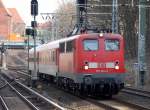 115 261-0 mit PbZ Richtung Berliner Innenring, 18.03.10 Berlin Sch�nhauser Allee.
