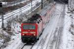 RB10 nach Nauen mit 143 809-2 Richtung Berlin-Jungfernheide, 22.01.13 Berlin-Putlitzbr�cke.
