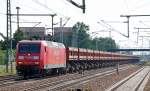 145 053-5 mit Ganzzug Sch�ttgutkippwagen, 04.07.12 Bhf.