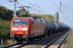 145 037-8 mit Kesselwagenzug am 06.10.14 Berlin-Hohenschönhausen.