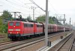 Doppeltraktion 151 020-5 + 151 002-3 mit einem Ganzzug Selbstentladewagen (Erzbef�llung) Richtung Karower Kreuz Berlin, 11.08.10 Berlin-Blankenburg.