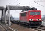 155 117-5 mit einem Leerzug Containertragwagen Richtung Bornholmer Str., 15.02.11 Berlin-Pankow.