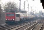 155 020-1 mit Kesselwagenzug Richtung Schwedt �ber Bernau, 24.02.11 Berlin-Karow.