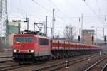155 035-9 mit einem Ganzzug Sch�ttgutkippwagen am 24.01.12 Bhf.