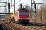 155 089-6 mit einem Teilst�ck des Schieneschleifzuges Speno RR 24 MC7 bei der Durchfahrt im Bhf.