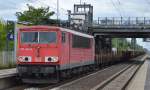 155 040-9 mit einem Gannzug Drehgestell-Flachwagen (leer) am 16.06.15 Durchfahrt Bhf.