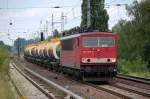 155 007-8 mit kasachischen Kesselwagen f�r Phosphorbef�llung Richtung Karower Kreuz Berlin unterwegs, 27.07.10 Berlin-Karow.