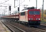 155 036-7 mit einem Ganzzug Sch�ttgutkippwagen vom Typ Fans 128 am 20.10.08 Bhf.