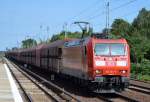 185 161-7 mit einem Ganzzug Schüttgutwagen am 17.06.15 Berlin-Hirschgarten.