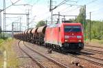 185 285-4 mit einem Ganzzug Sch�ttgutwagen, 19.07.11 Bhf.