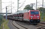185 250-8 mit einem Ganzzug Autransportwageneinheiten mit fabrikneuen Toyota Avensis und Toyota SUV Typ? beladen, 03.09.10 Durchfahrt im Bhf.