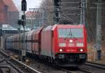 185 346-4 mit einem Ganzzug polnischer Sch�ttgutwagen Richtung Bornholmer Str., 16.03.11 Berlin Sch�nhauser Allee.
