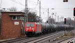 185 385-2 mit Kesselwagenzug Richtung Schwedt am 20.01.14 Berlin-Karow.