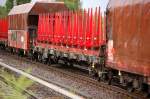 Drehgestell-Flachwagen mit Gestell f�r Drahtrollen der DB/Railion vom Typ Rs-y 667 am 13.07.12 Berlin-Karow.