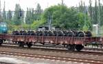 Flachwagen mit zwei Rads�tzen und Rungen der DB mit Rads�tzen beladen eingestellt mit der Nr.