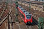 RB10 Richtung Berlin Hbf.(tief) mit 442 321 + 442 ??? am 08.04.13 Berlin-Putlitzbr�cke.