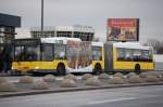 Ein Gelenkbus der Berliner Verkehrsbetriebe (BVG Nr.4031, Typ MAN GN 03 (NG 313)) auf der Linie TXL Richtung Berlin-Alexanderplatz auf der Berliner Beusselbr�cke am 20.12.11.