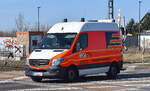 KST Krankentransport Schmidt Teutschenthal mit einem MB Sprinter Hochdach Krankentransportfahrzeug am 20.03.25 Höhe Bahnübergang Bahnhof Rodleben.