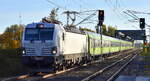 FlixTrain GmbH, München [D] mit der geleasten ELL Vectron  7193 606  [NVR-Nummer: 91 80 7193 606-9 D-ELOC] und Wagengarnitur aus Richtung Leipzig am 13.10.25 Durchfahrt Bahnhof Roßlau