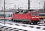 120 119-3 mit PbZ bestehend aus dem Berlin-Warschau Express Richtung Berlin Grunewald, 14.12.10 Berlin-Beusselstr.