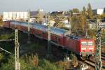 PbZ ? am Samtag Nachmittag mit 114 034-2 und vier Doppelstockwagen und einer weiteren 114�r? am Ende Richtung Berlin Jungfernheide, 21.10.11 Berlin Putlitzbr�cke.