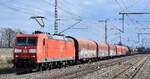 DB Cargo AG, Mainz [D) mit ihrer  185 075-9  [NVR-Nummer: 91 80 6185 075-9 D-DB] und einem gemischten Güterzug am 09.04.25 Höhe Bahnhof Rodleben.