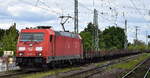 DB Cargo AG, Mainz [D] mit ihrer  185 267-2  [NVR-Nummer: 91 80 6185 267-2 D-DB] und einem gemischten Güterzug am 08.05.25 Höhe Bahnhof Magdeburg Neustadt.