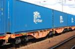Containertragwageneinheit in oange vom Wageneinsteller wascosa, im Bild der Wagen mit der Nr.