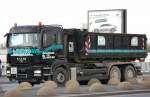 MAN TGS 26.440 Abrollkipper der Entsorgungfirma DINO aus Berlin, 20.04.12 Berlin Beusselbr�cke.