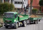 MAN TGS 18.360 EEV Baukipper mit Hydraulikgreifarm + H�nger bei Erdarbeiten am S-Bhf.