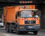 Oranges M�llentsorgungsfahrzeug nicht von der BSR sondern von?, ein MAN 26.293 mit FAUN M�llpresse (VARIOPRESS) am 22.05.10 Berlin-Kreuzberg.