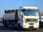 Ein MAN TGX 26.440 Baustofftransporter (Selbstlader) der Fa.