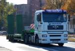 MAN TGA 26.430 mit Ladebr�ckenauflieger der Fa.
