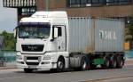 MAN TGX 18.440 Sattelzug mit Container, 13.06.13 Berlin-Putlitzbr�cke.
