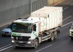 MB ACTROS 2546 Abrollkipper mit einem Spezial-M�llentsorgungscontainer der Fa.