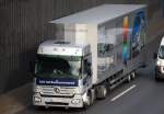 MB ACTROS Typ? vom firmeneigenen Lack-und Karosseriezentrum von Mercedes Benz mit gro�volumigen sehr hohen Auflieger, 04.11.11 Berliner Stadtautobahn H�he Kaiserdamm.